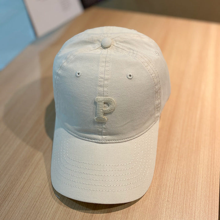 solid color retro lowercase P-shaped baseball cap