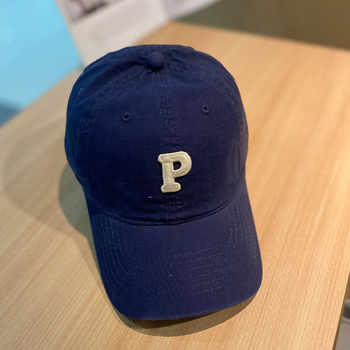 solid color retro lowercase P-shaped baseball cap